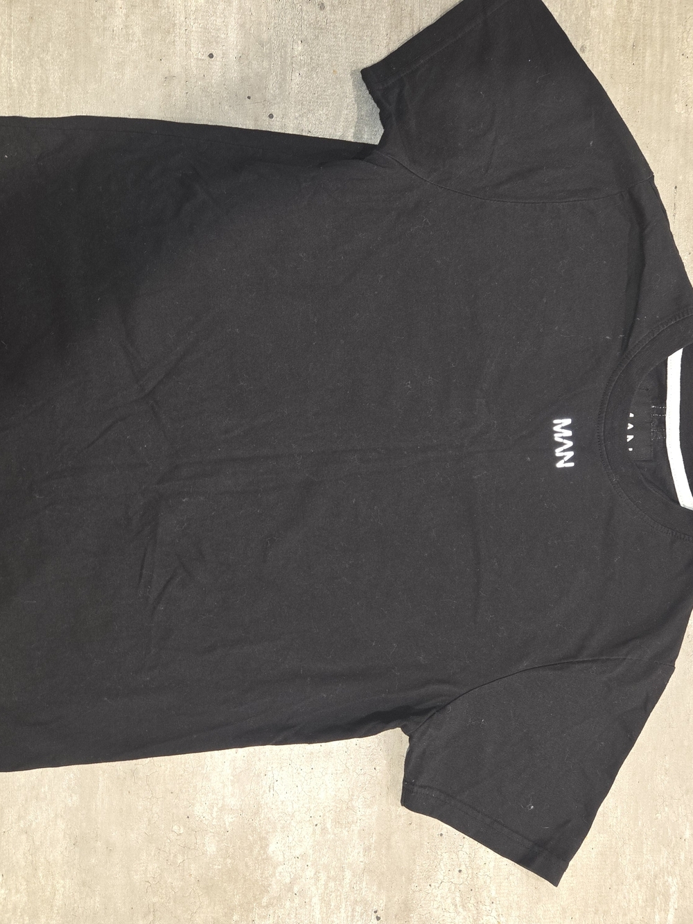 Black Short-Sleeve Crewneck T-Shirt with Small White 'MAN' Chest Logo